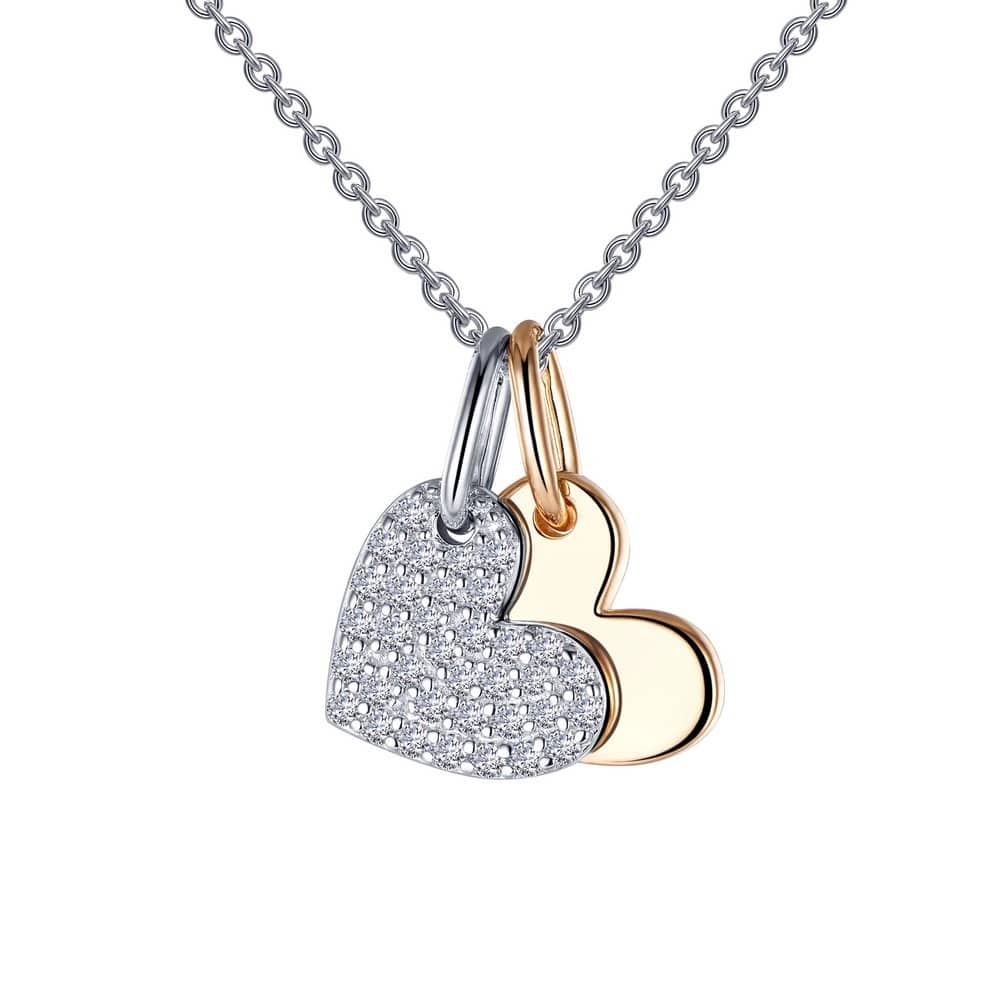 $210.00 - Sterling sliver 2-tone pendant. Shadow hearts pendant, one heart is sterling and set with 0.3 ct. TW simulated diamonds, the 2nd heart is yellow gold plated with a bright finish. Comes with an 16