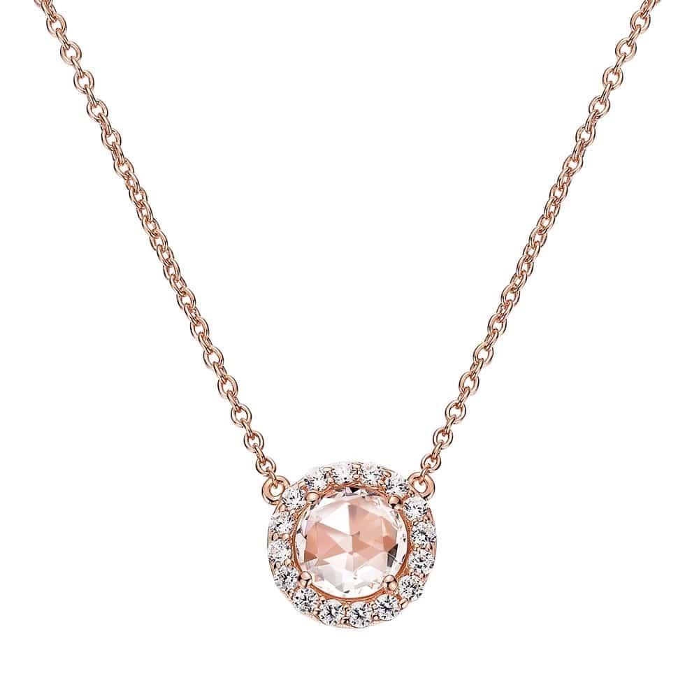 $195.00 - Sterling silver and rose gold plated pendant. A halo setting holds a round simulated morganite stone the halo is set with simulated diamonds. The chain length is 16-18